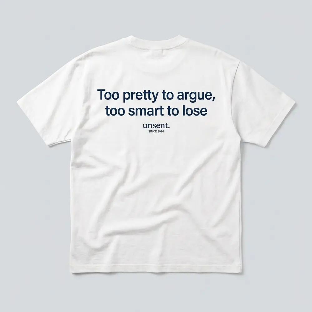 White tee, navy print on the back: Too pretty to argue, too smart to lose